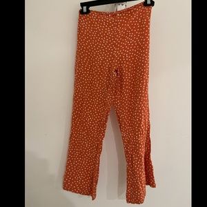Orange, O’Neal polka dotted pants